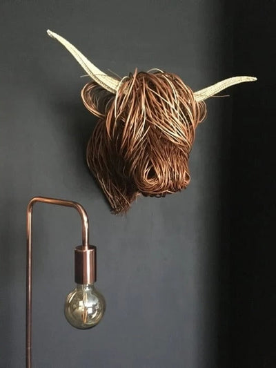 Dekorative Wandskulptur einer Kuh