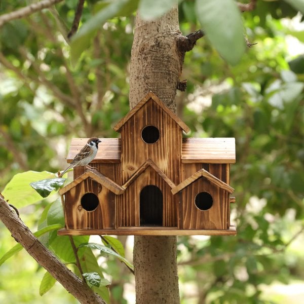 Handgefertigtes hölzernes Vogelhaus mit 6 Einfluglöchern
